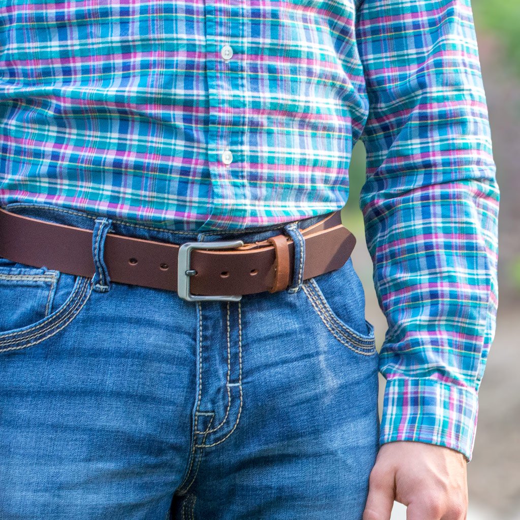 Roan Mountain Titanium Belt on model. Soft brown strap looks great with jeans. 1½inches (38mm) wide.
